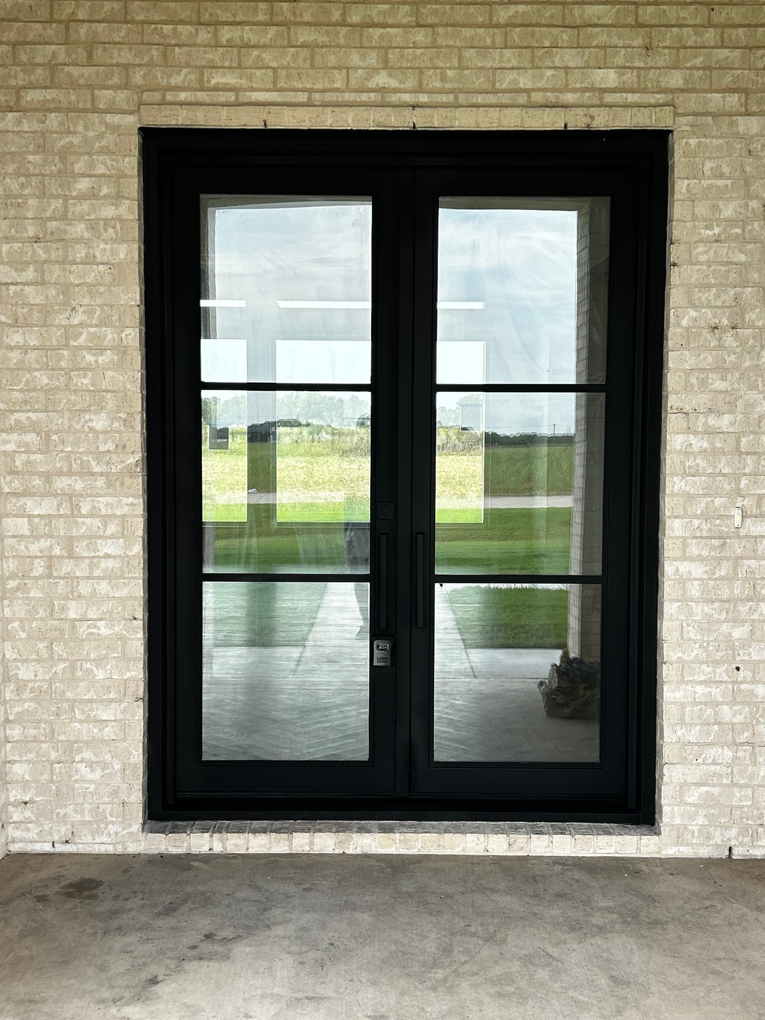 Grid window set into a masonry wall
