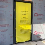 protective wrapping on door